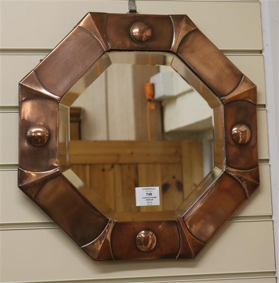 A copper frame octagonal mirror, W.43cm